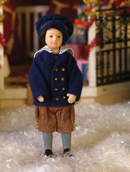 JEUNE GARÇON EN VESTE BLEUE MARINE AVEC BÉRET